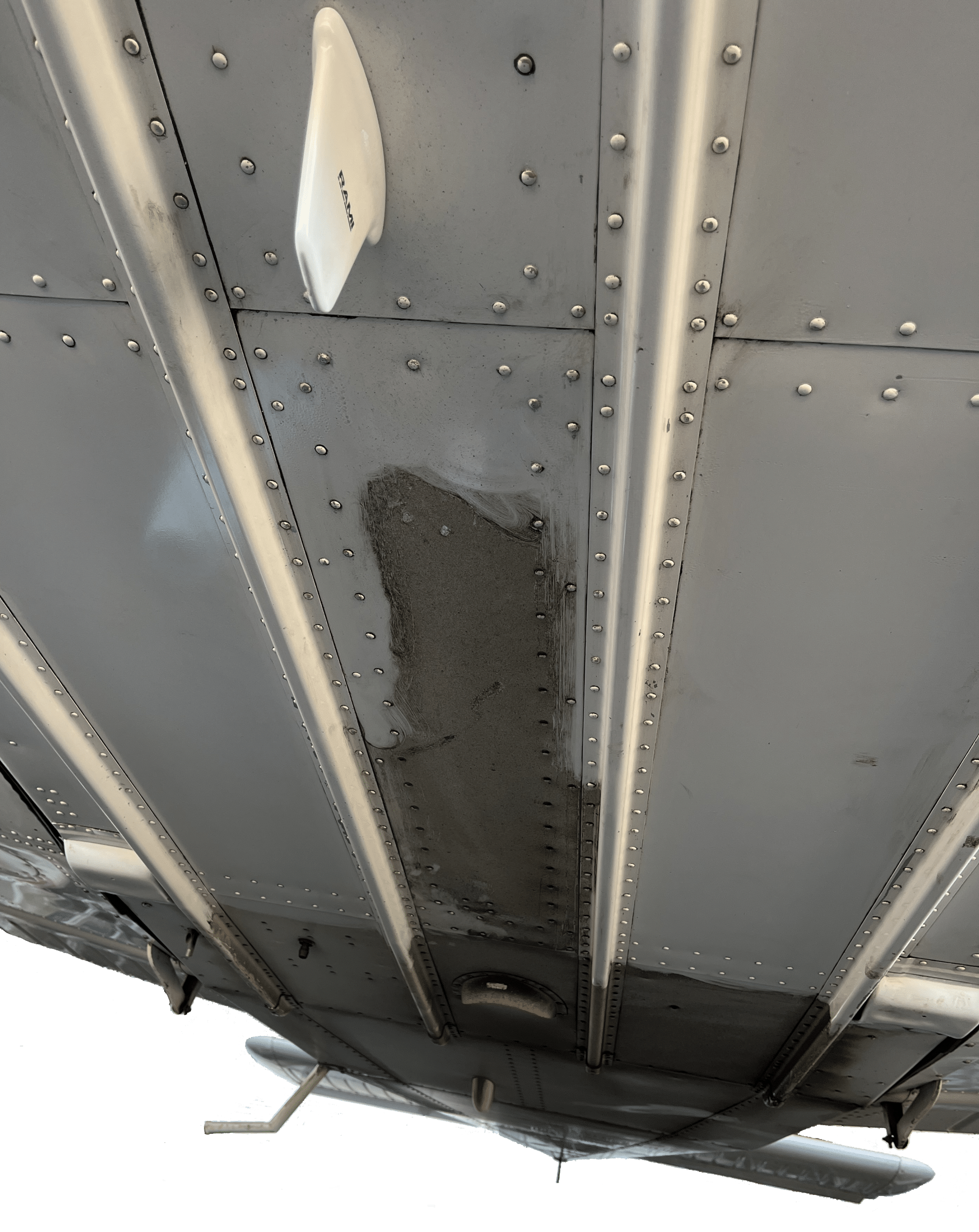 Plane Exhaust Soot and Oil Residue
