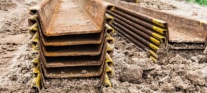 Rusted metal plates in storage yard
